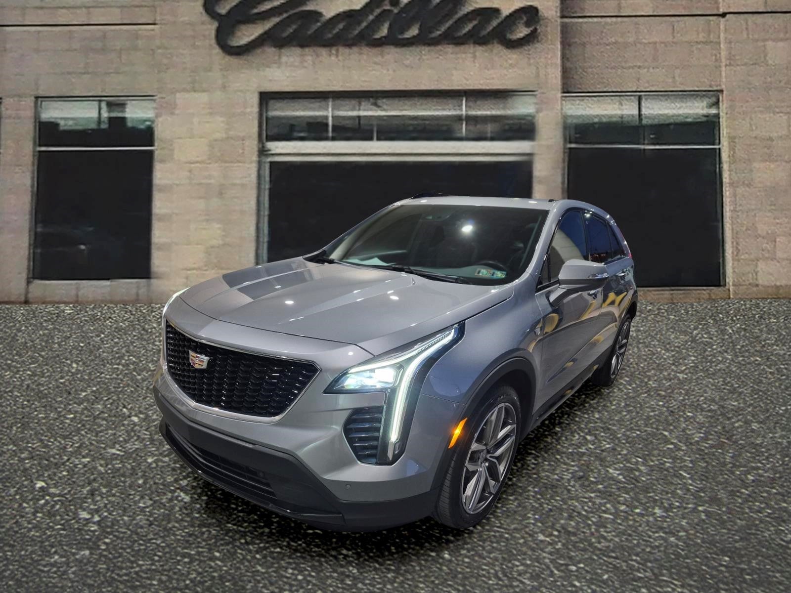 2023 Cadillac XT4 Sport in Argent Silver Metallic — front three-quarter view