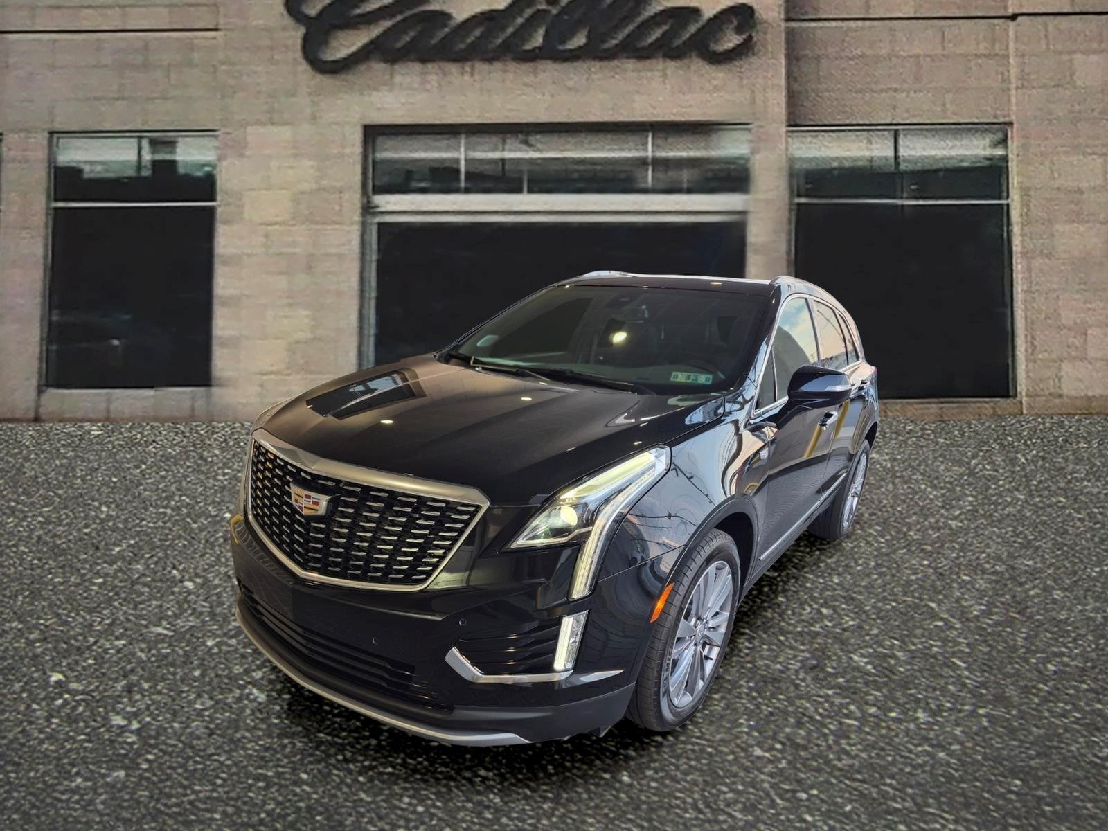 2024 Cadillac XT5 Premium Luxury in Stellar Black Metallic — front three-quarter view