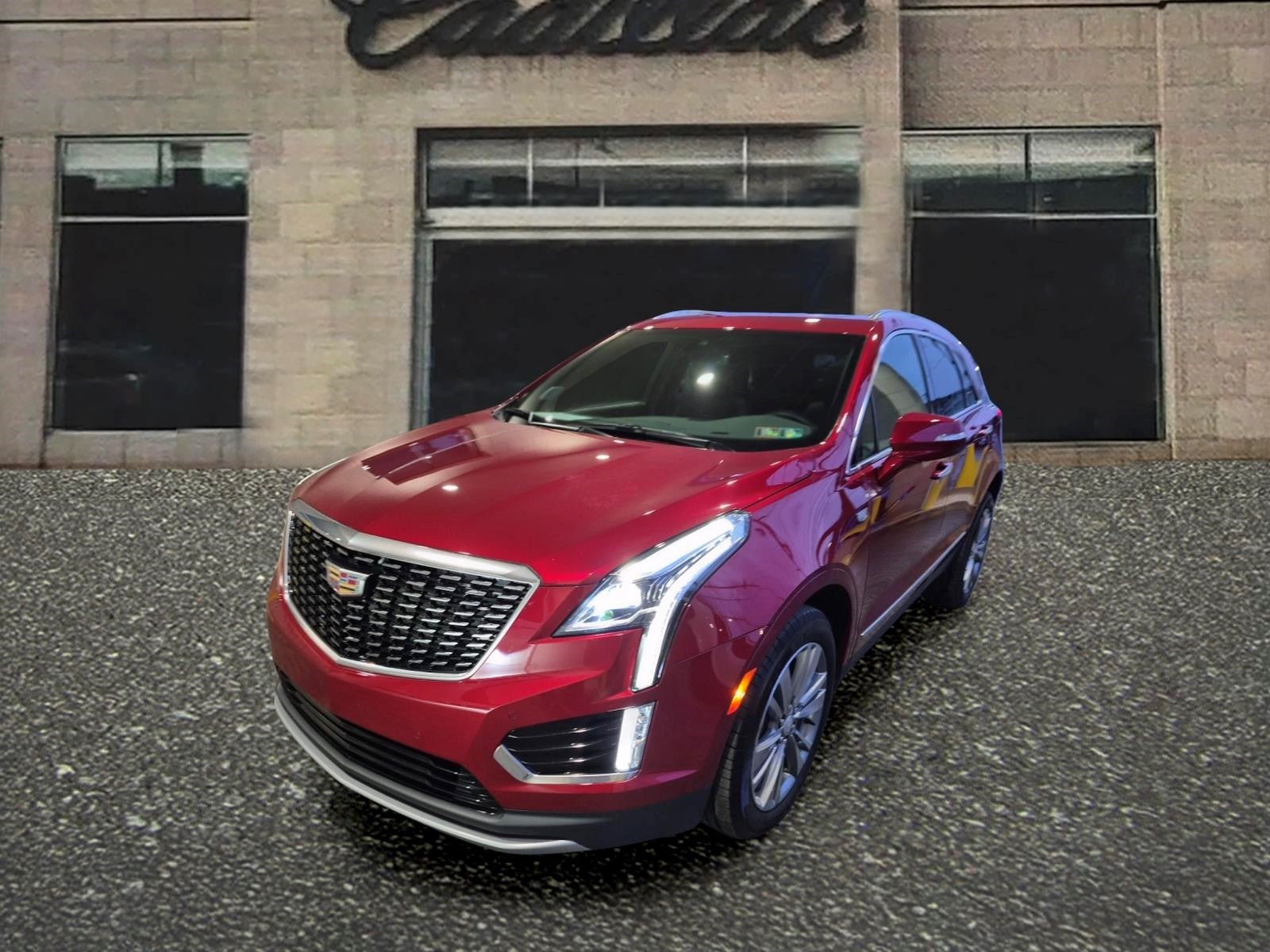 2024 Cadillac XT5 Premium Luxury in Radiant Red Tintcoat — front three-quarter view